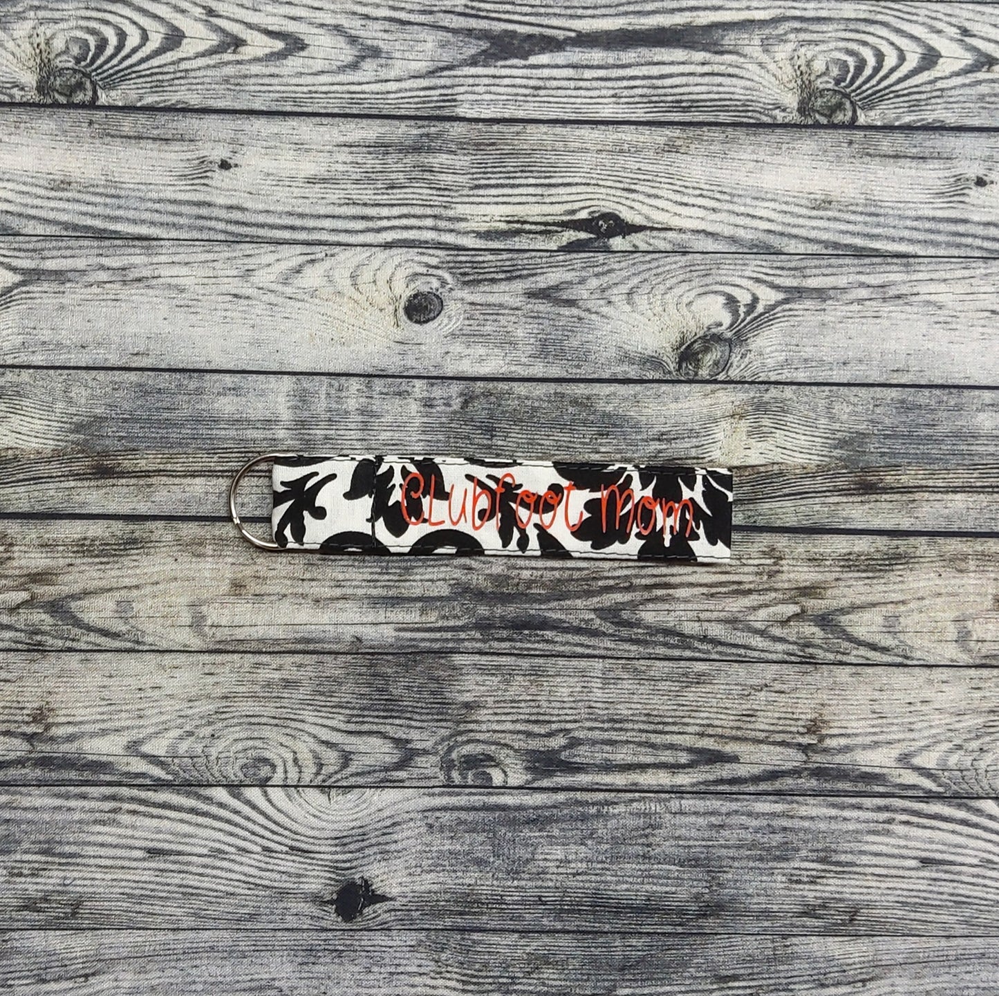 (Small) Black Floral + red "Clubfoot Mom"