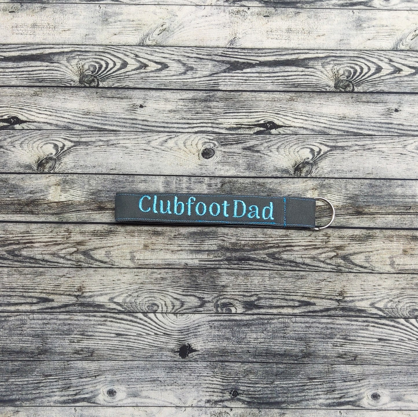(Long) Charcoal Canvas + Teal "Clubfoot Dad"