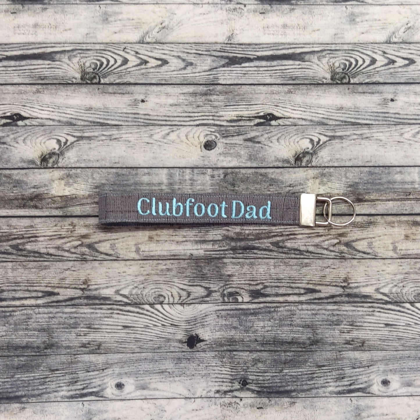 (Long) Charcoal Canvas + Teal "Clubfoot Dad"